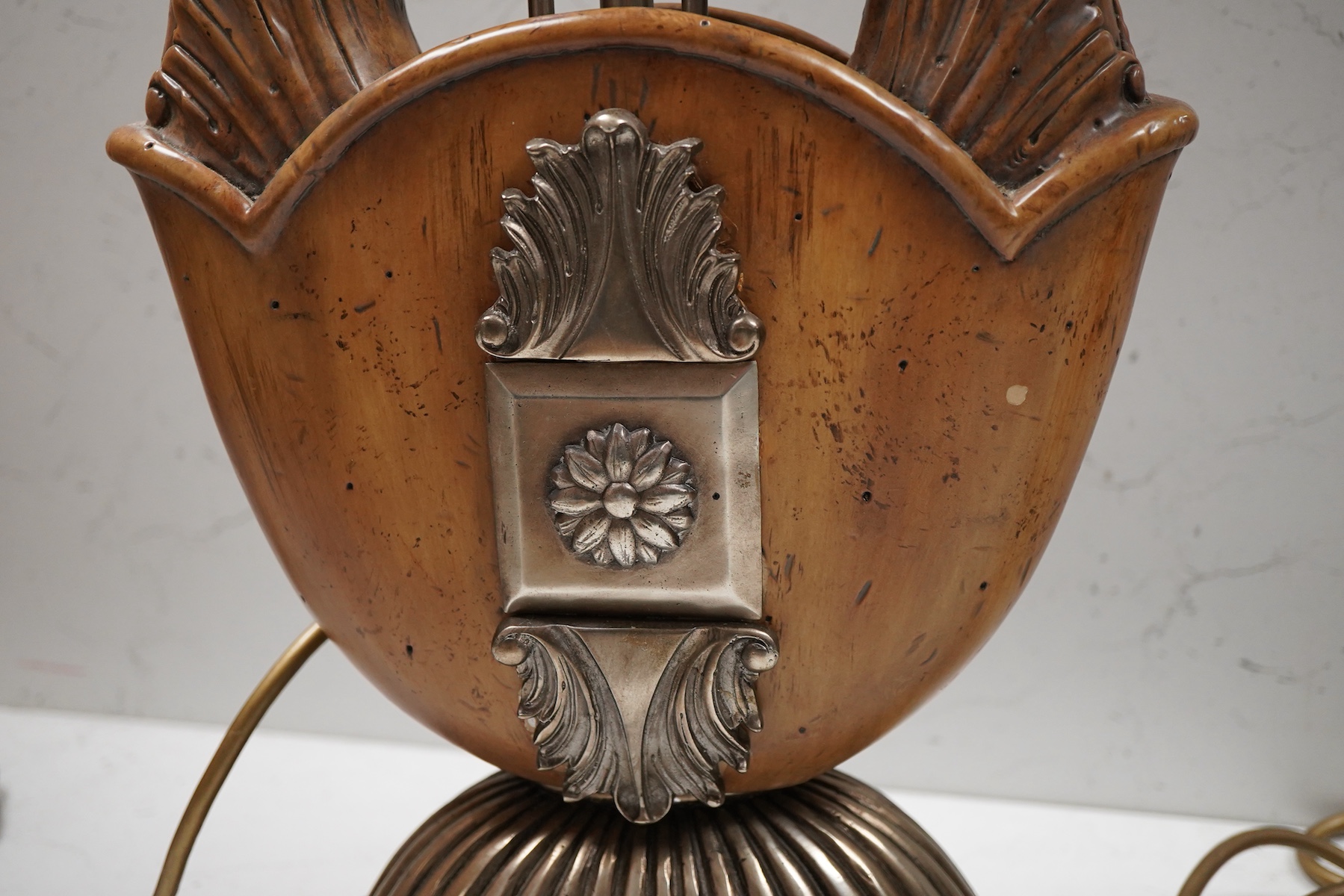 A pair of Maitland-Smith lyre shaped tablelamps